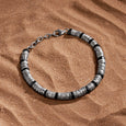 Defined Balance - Silver Heishi & Mantra Onyx Bracelet
